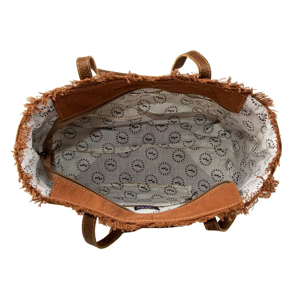 Myra Bag Blue Ridge Blossoms Crossbody: Vibrant Woven Rug, Hand-Tooled Leather, and Frayed Edge Accents